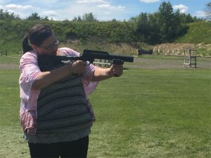 Renee Van Nett firing a launcher